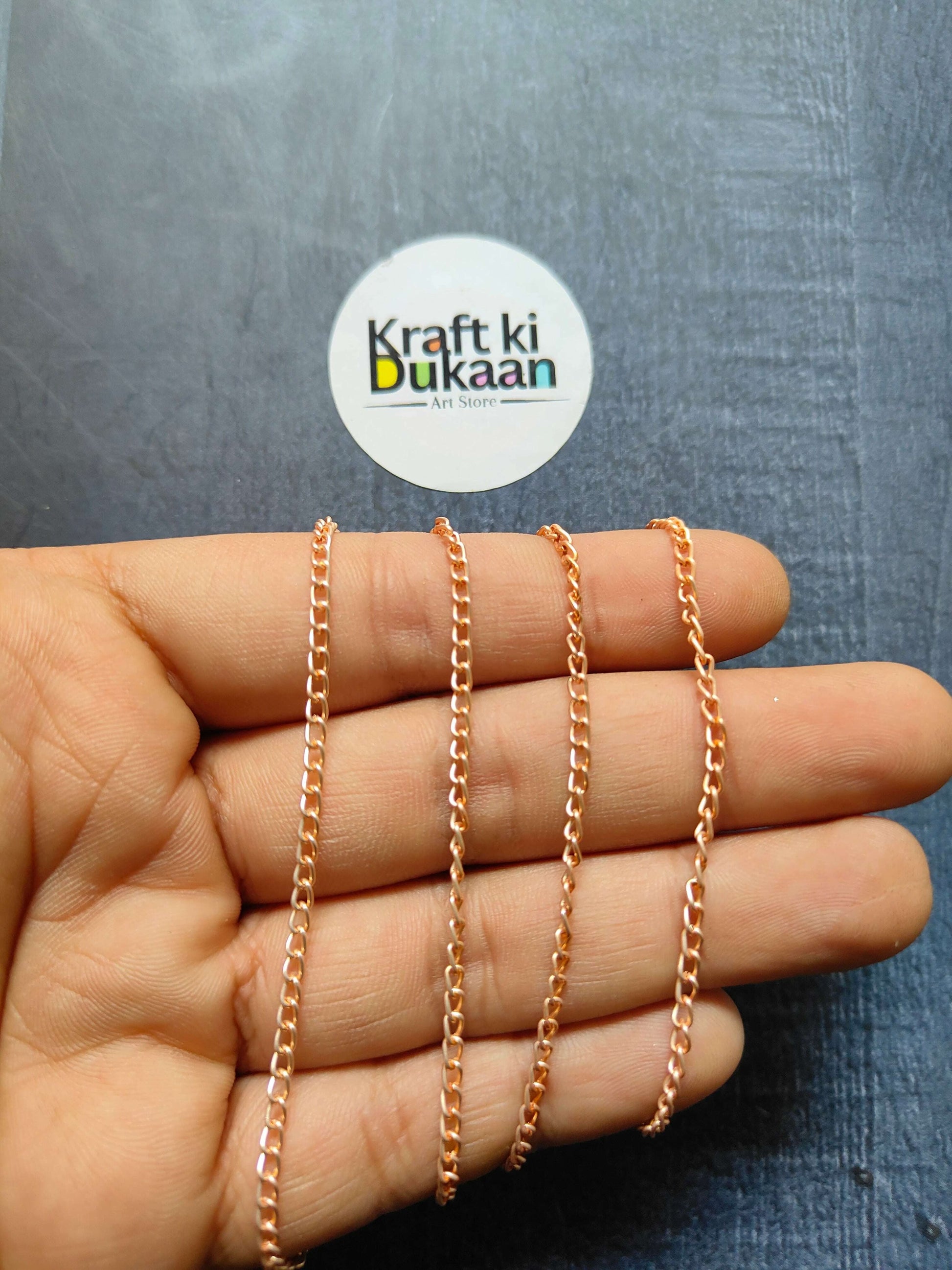 Jewellery Chain: gold, rose gold, and silver curb-link chains on fingers