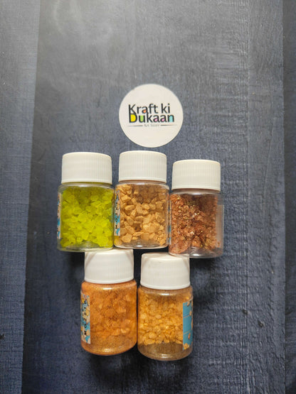 Glass stones pack of 5 in capped jars—green, amber, and brown hues