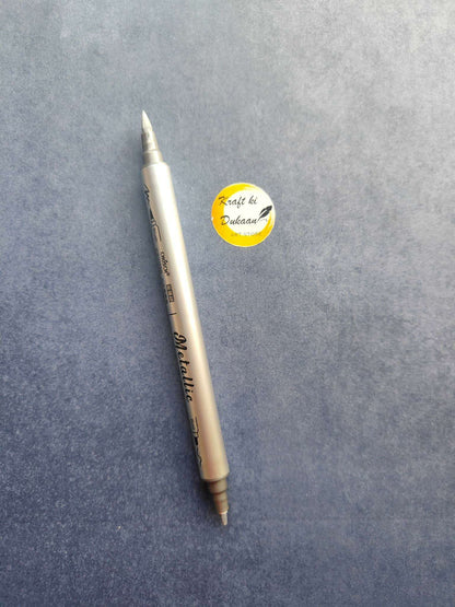 Silver metallic twin-tip marker with pointed ends