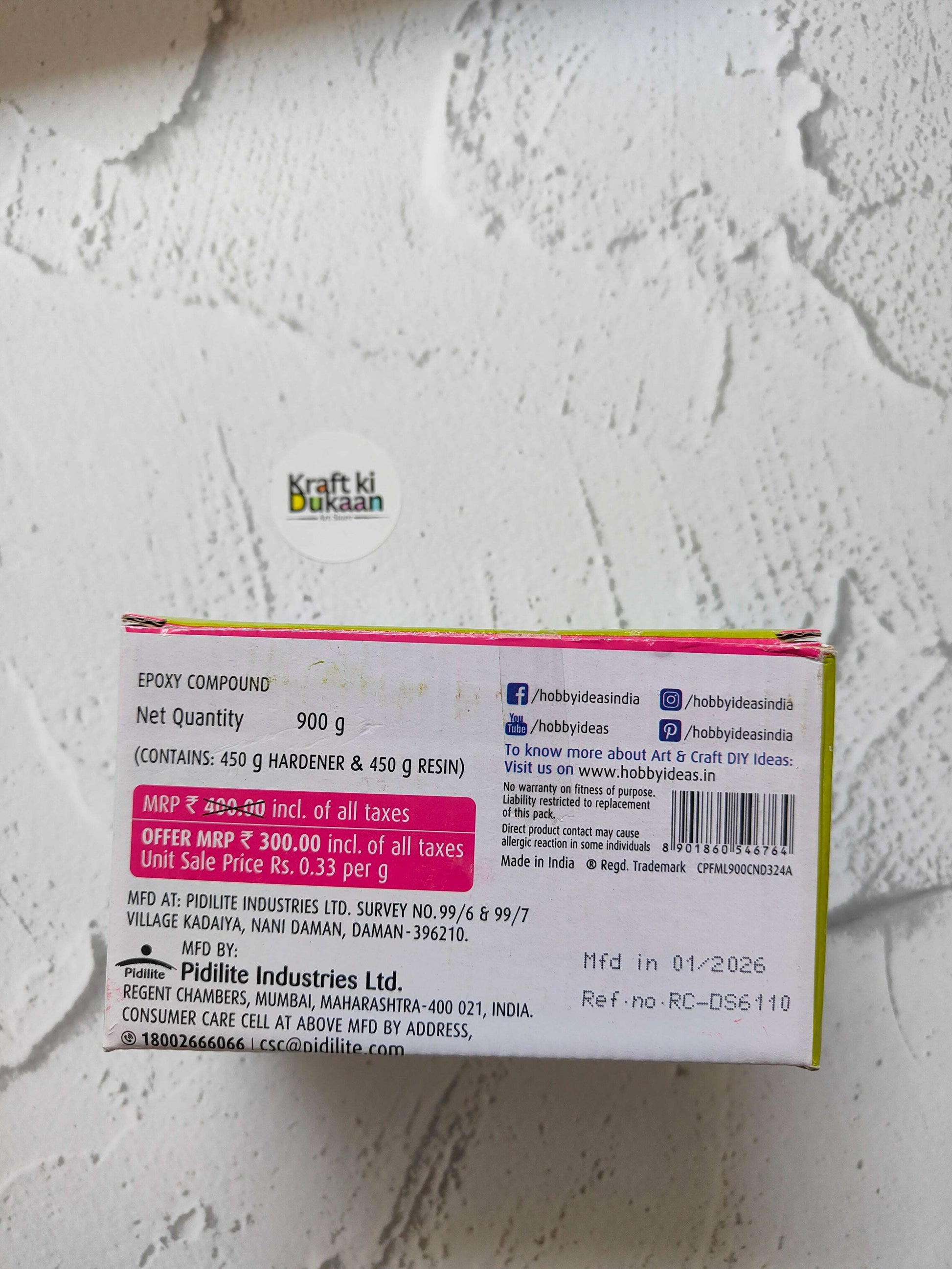 Epoxy compound 900 g pack back with quantity and manufacturing details text.