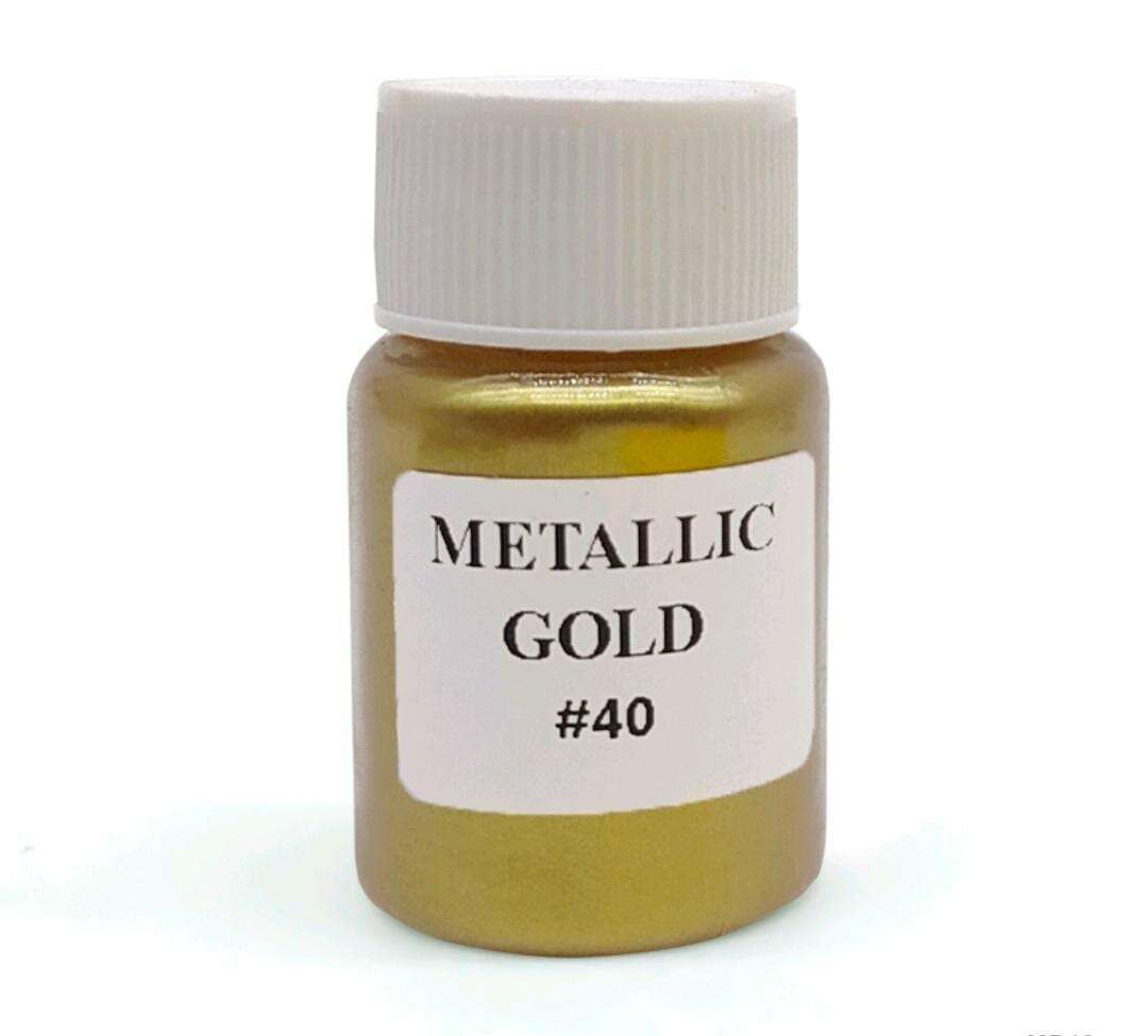 Metallic gold mica powder bottle, #40, gold-toned liquid.