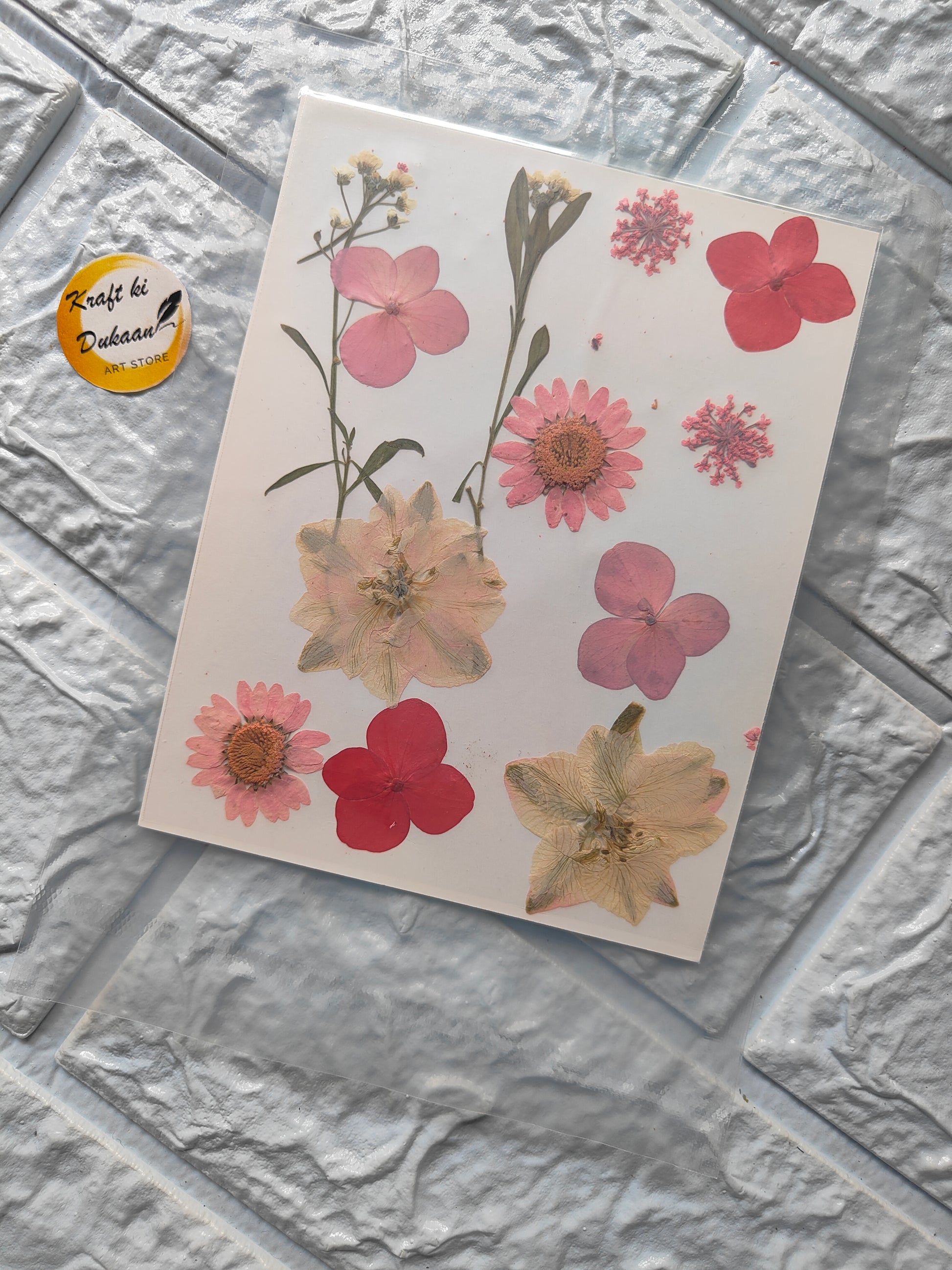 A14 resin art flower sheets featuring colorful pressed flowers on a white background