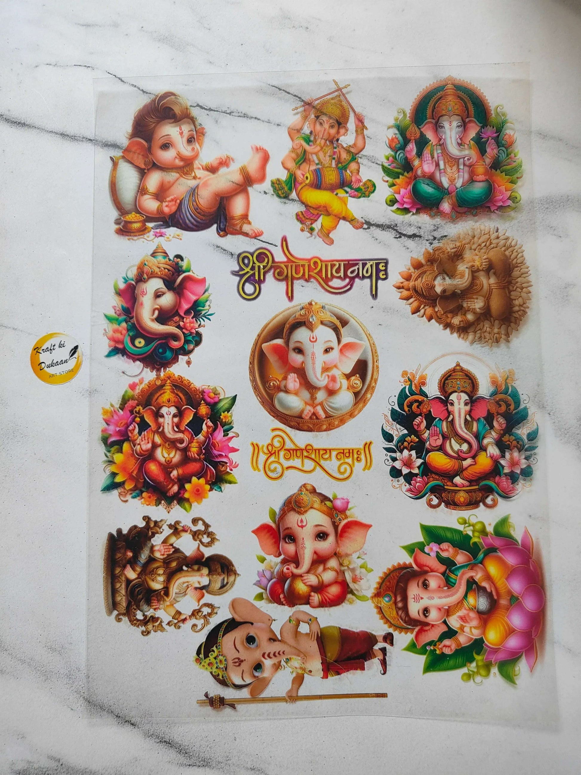 A4 insert sheet with colorful Ganesha deity illustrations and ornate stickers