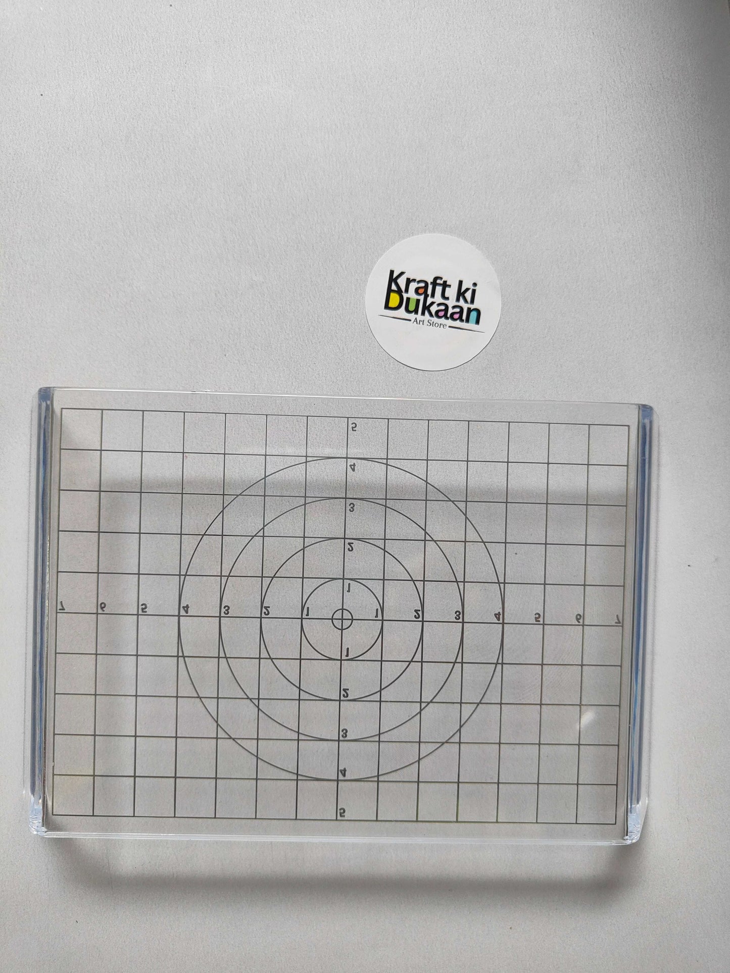 Acrylic clay press plate with grid and concentric circle guide lines