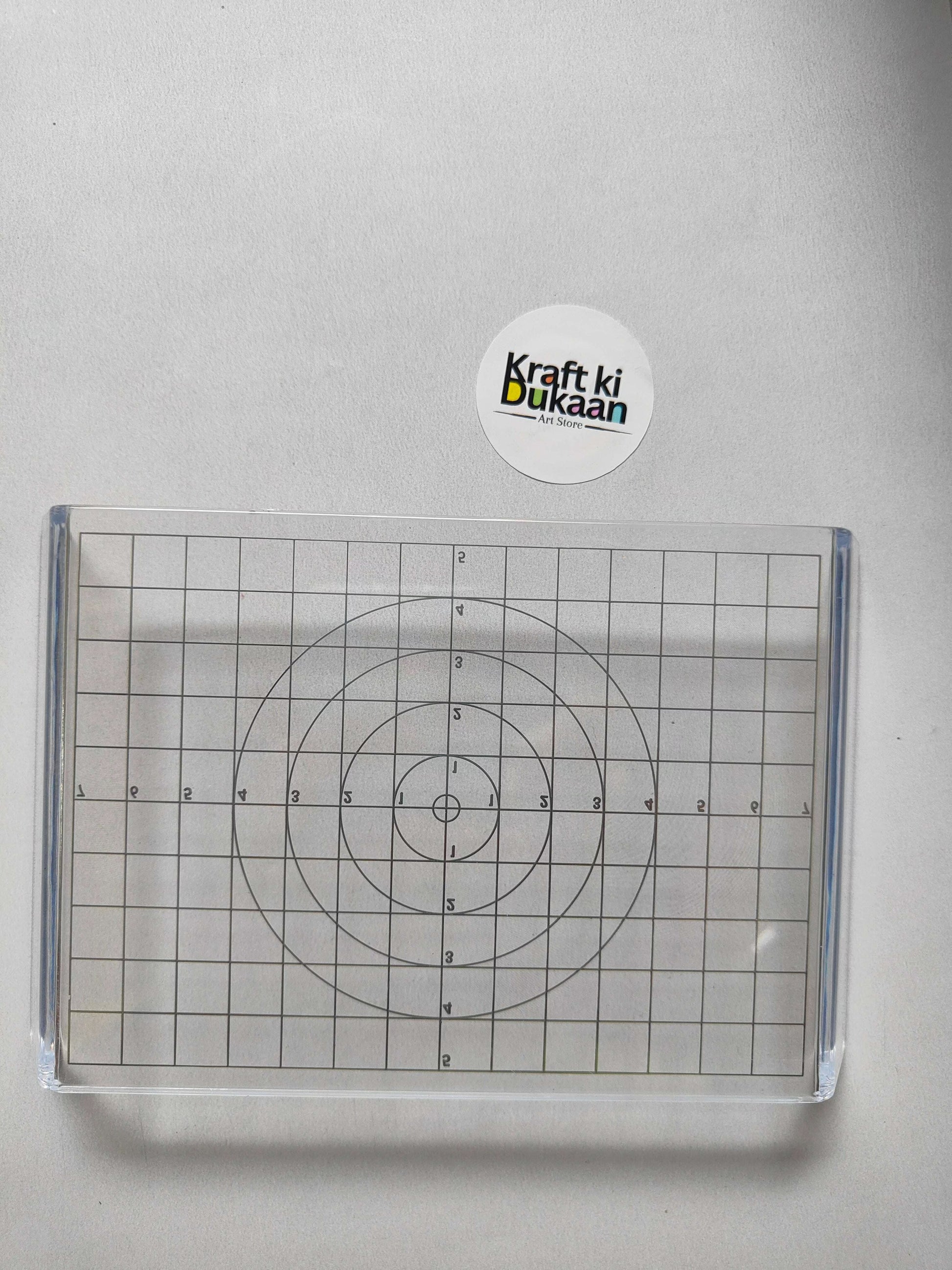Acrylic clay press plate with grid and concentric circle guide lines