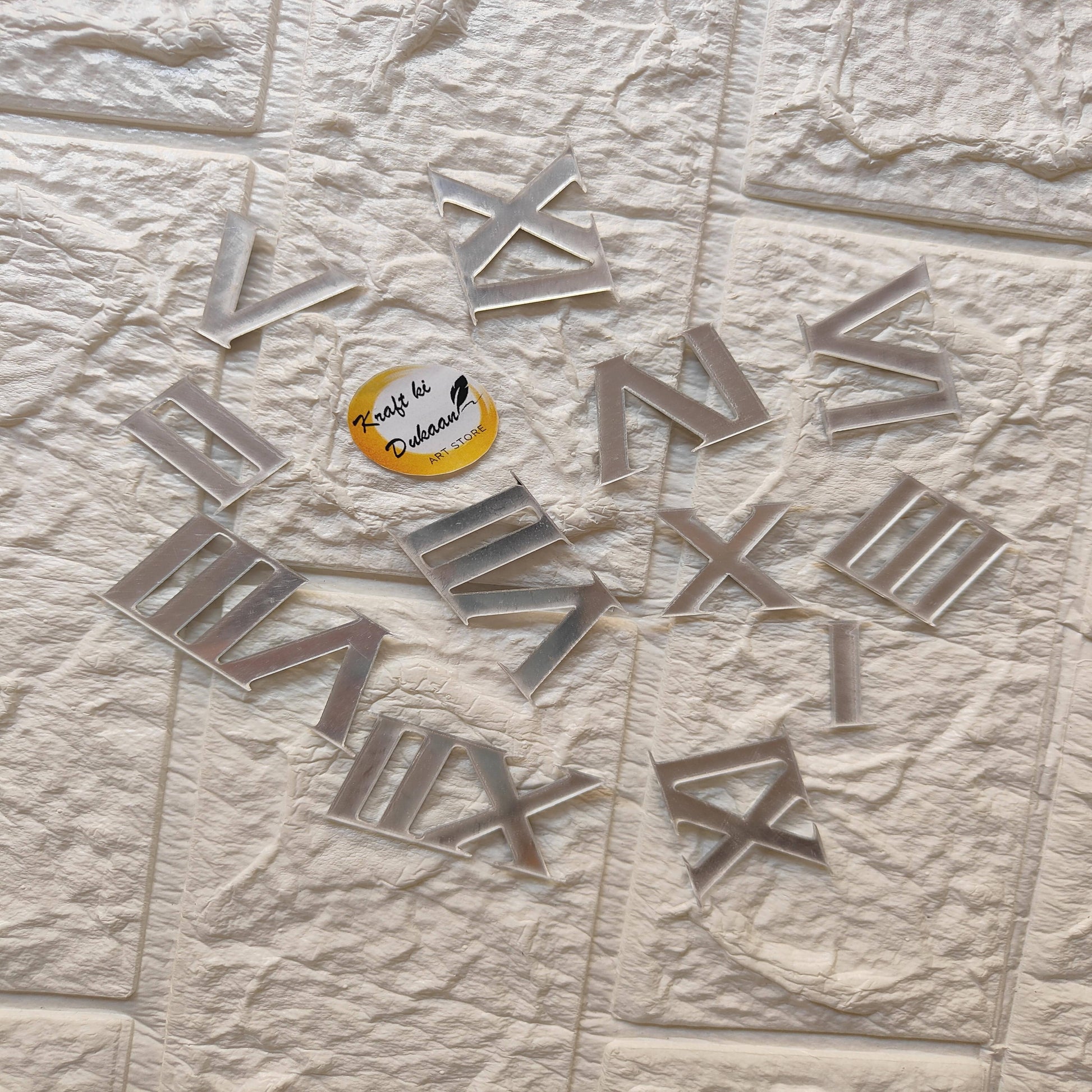 Acrylic Roman numerals for crafts displayed on a textured surface, ideal for creative projects