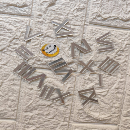 Acrylic Roman numerals for crafts displayed on a textured surface, ideal for creative projects