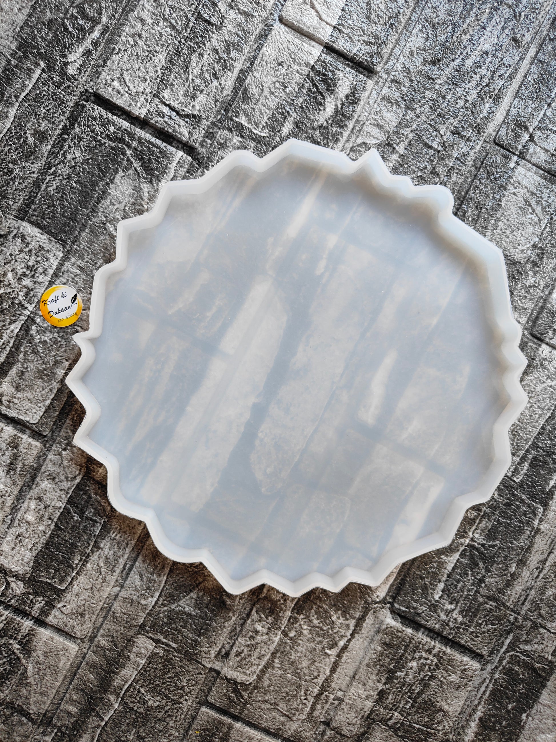 Agate round mould 10 inch in white silicone with a unique wavy edge for crafting and baking projects