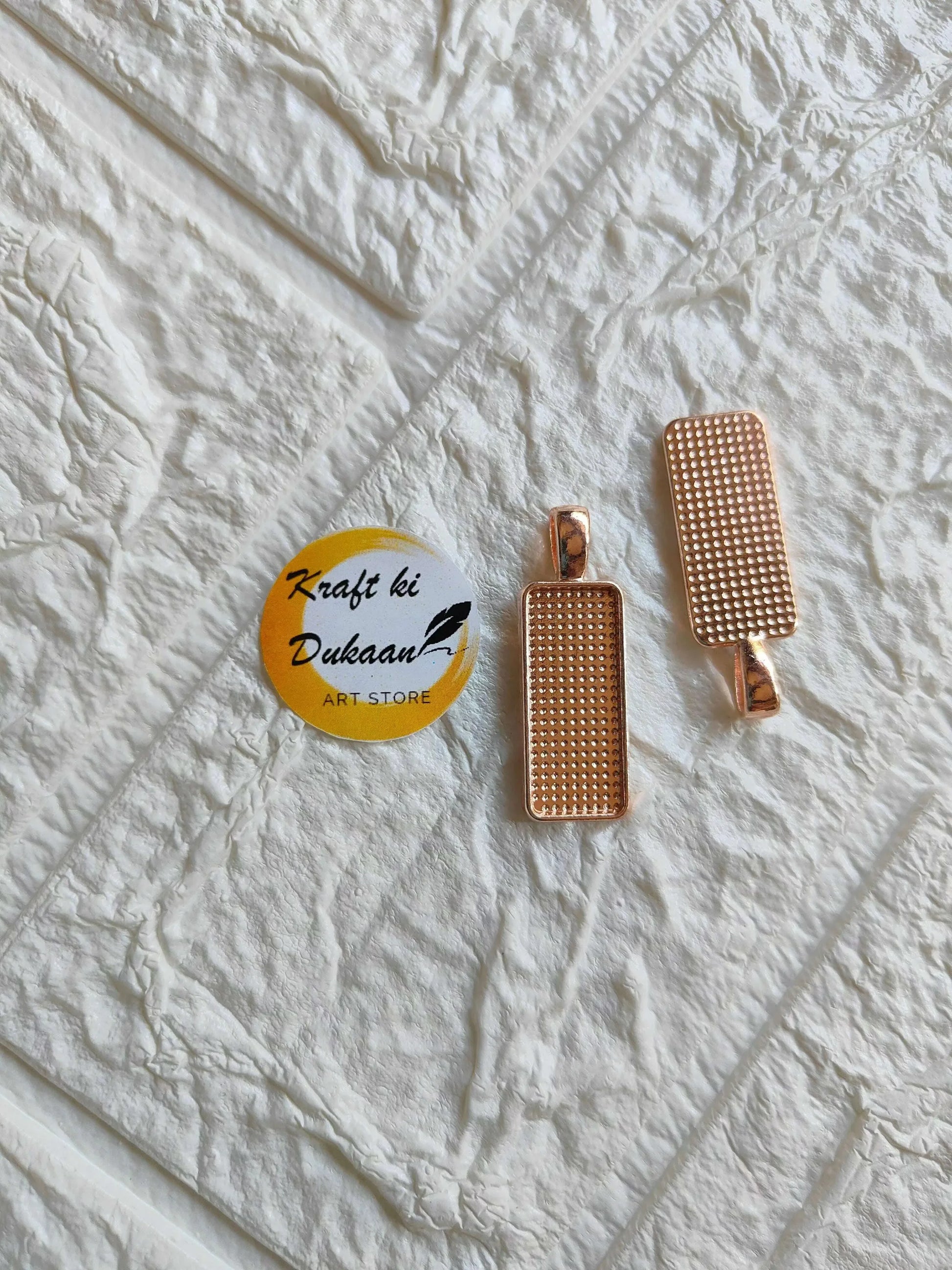 Rose gold rectangular bezel pendant tray bases set, two pieces with textured grid