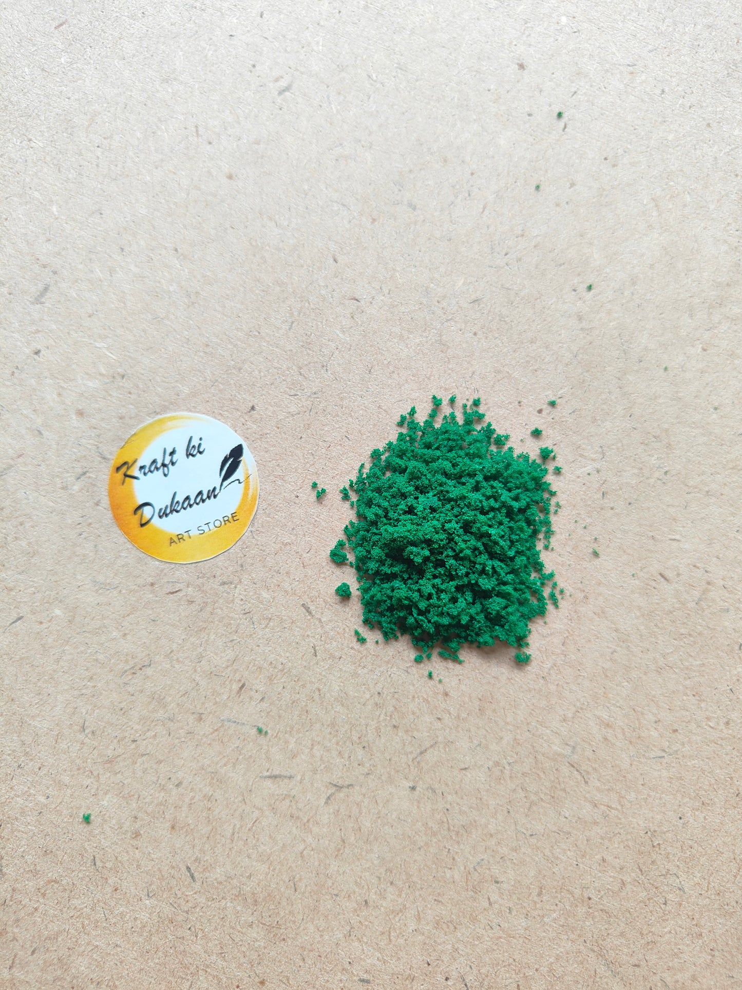Vibrant green artificial moss for resin art displayed on a textured surface, perfect for crafting