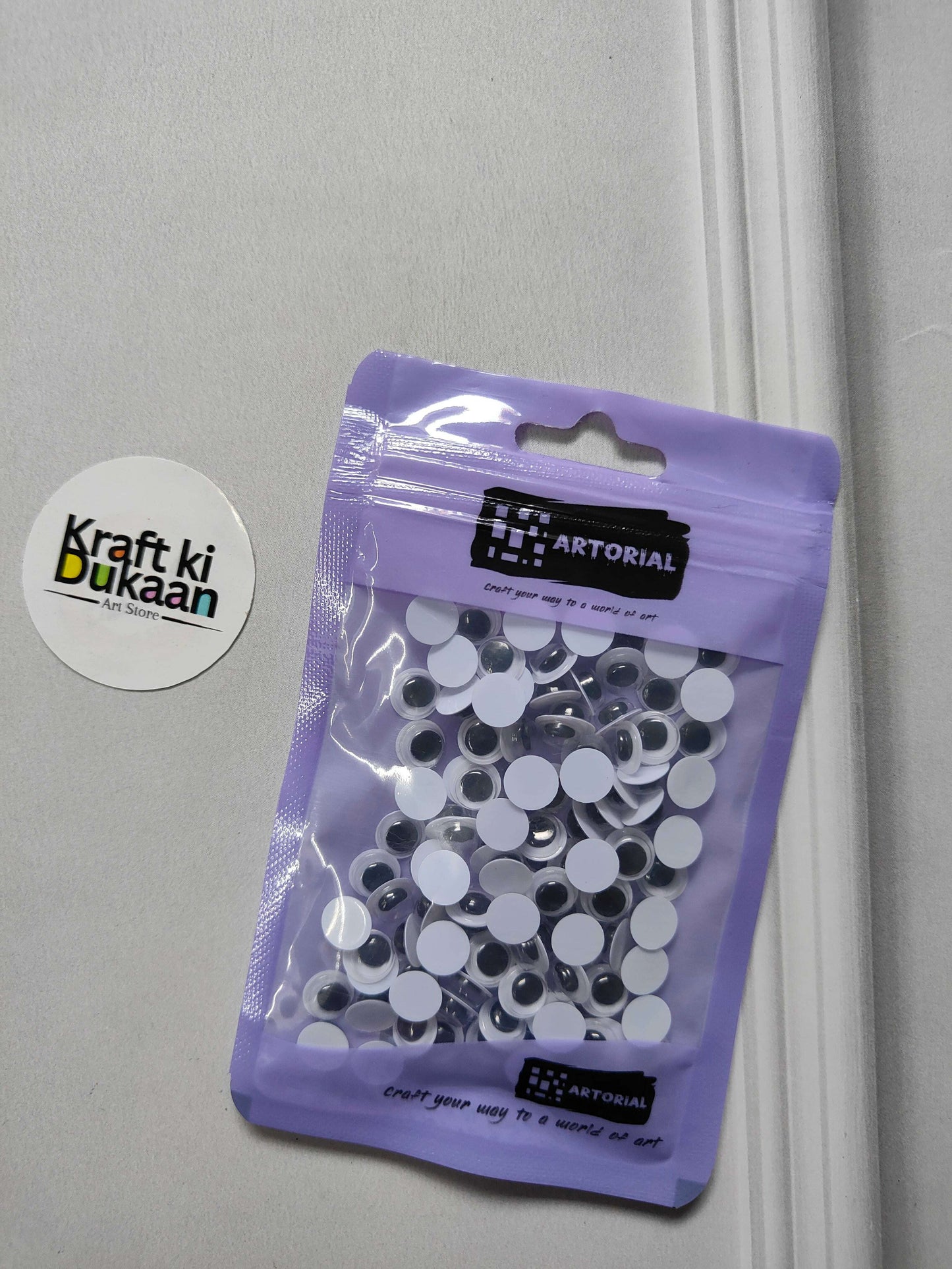 8mm round googly eyes, 115-pack in purple resealable pouch