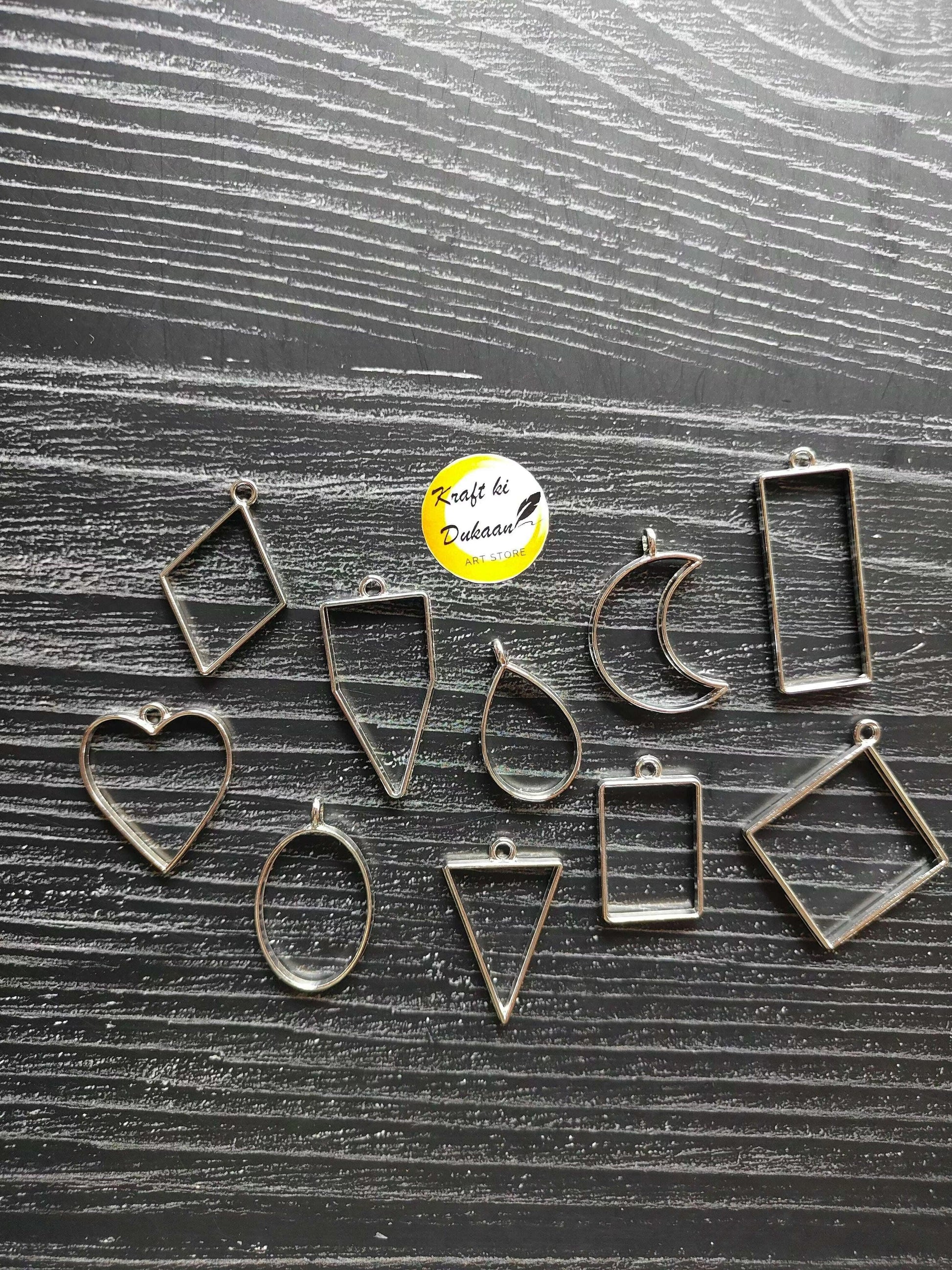 Plain bezel pendant mix set of 10, teardrop, square, heart, crescent shapes in steel silver