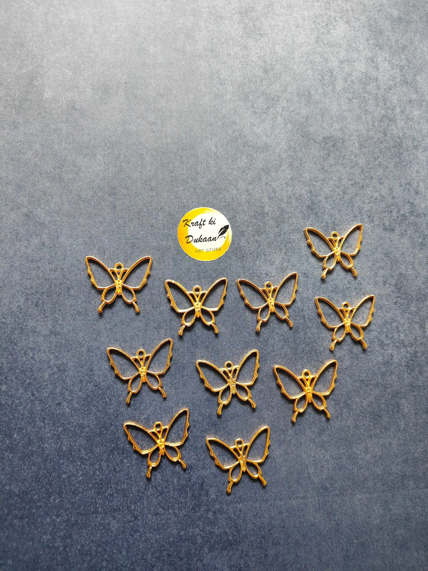 Butterfly bezel pendant set of 10, gold-tone butterfly charms