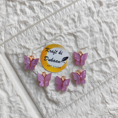 Set of butterfly resin pendant charms in lavender with gold accents for crafting and jewelry making