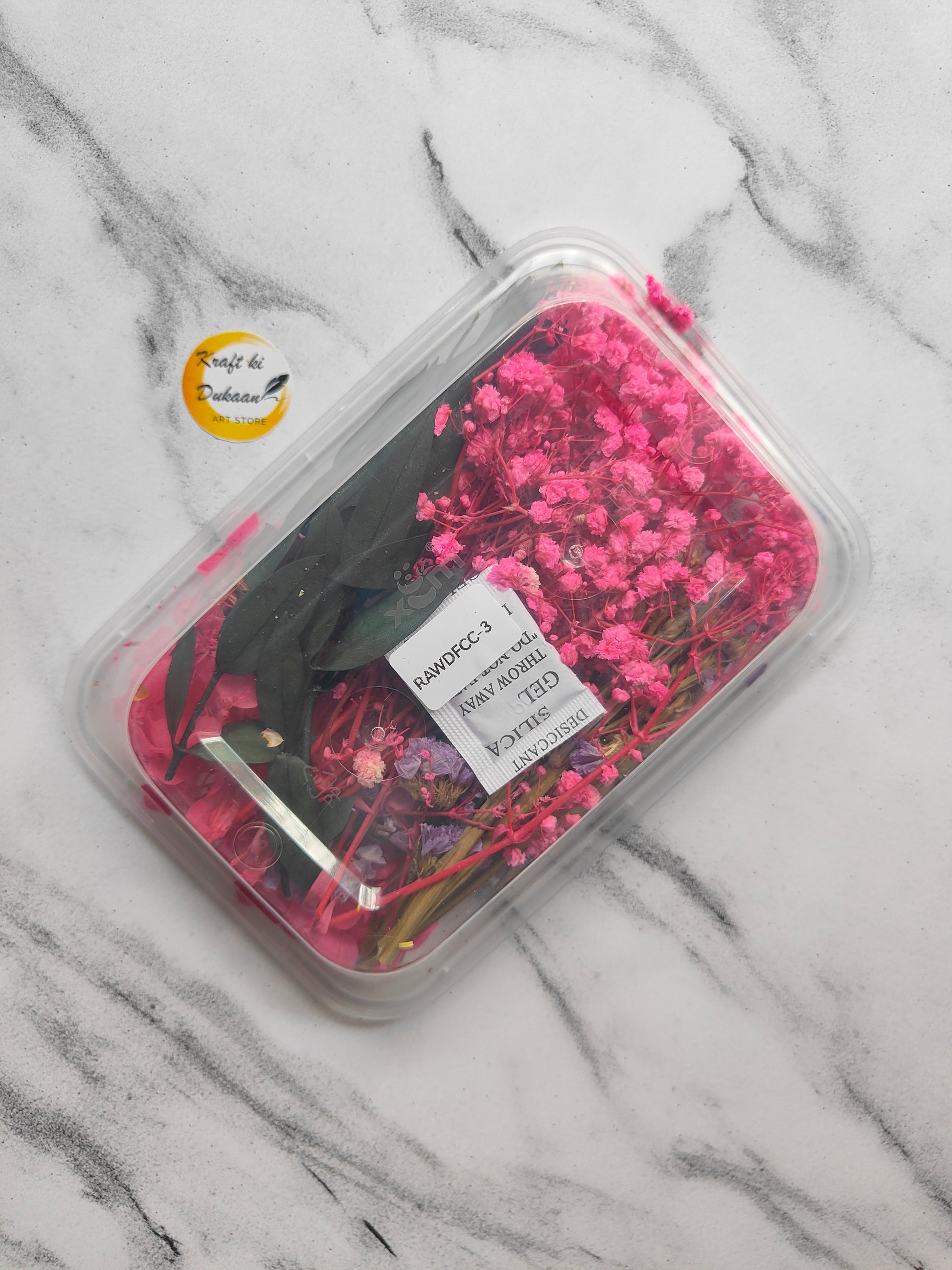 Dried flower mixture in a transparent container, perfect to buy dried flowers online India.
