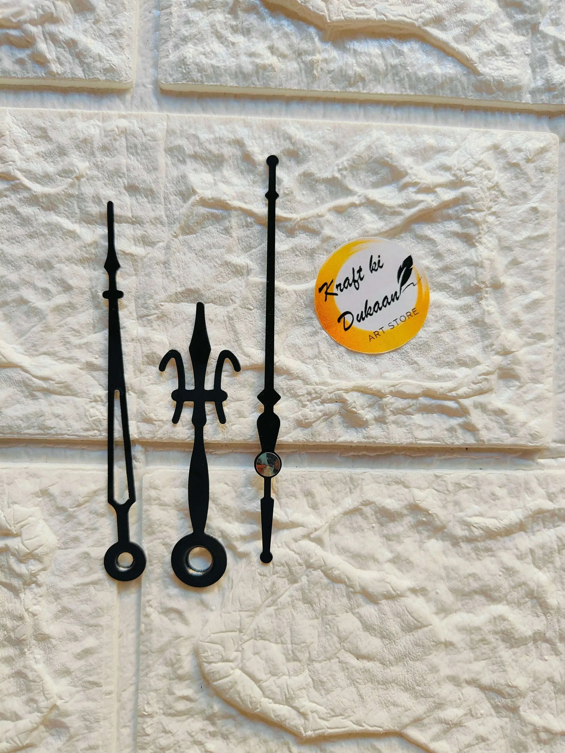 Clock Hands Metal A1 in black metal with decorative pointer tips and circular mounts