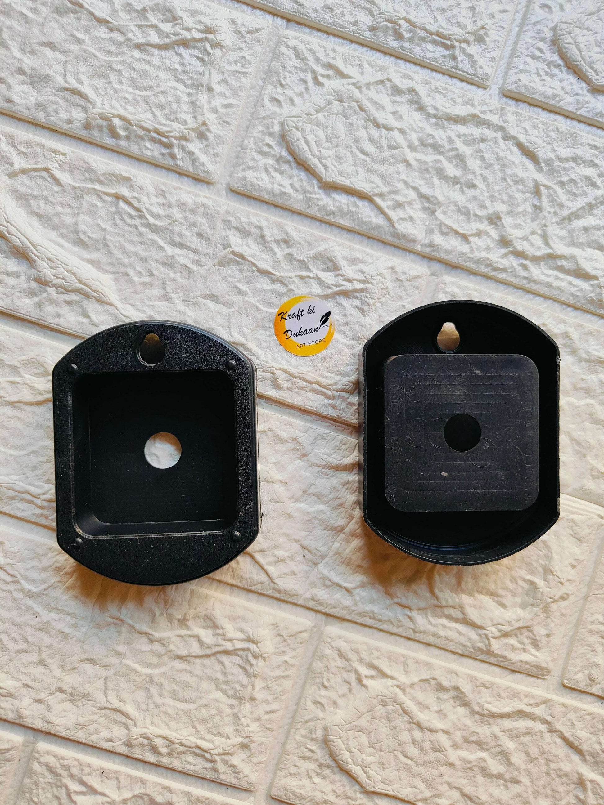 clock-machine-hanging-cover-black-surface