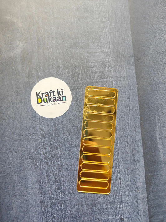 Gold acrylic clock number sticks, outlined digit boxes in a single strip