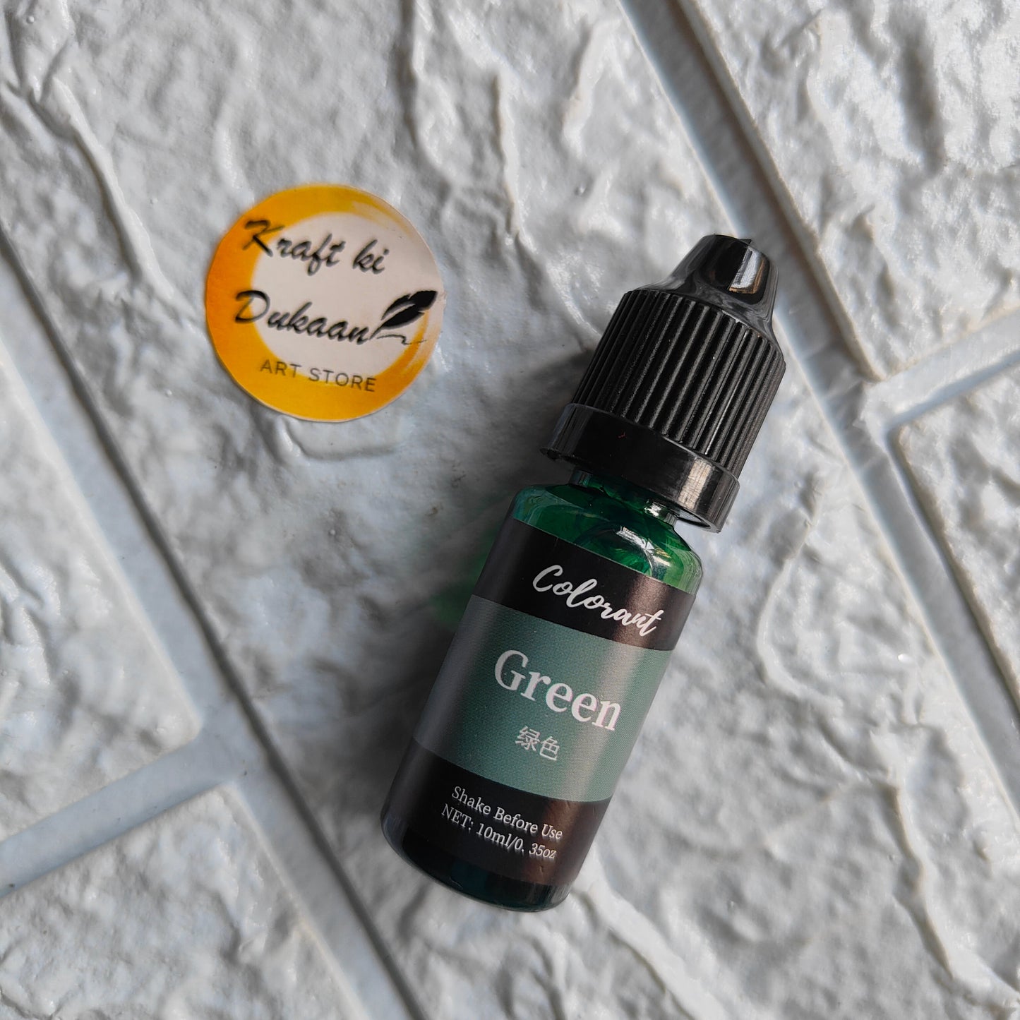 Green resin colorant from Kraft ki Dukaan in a 10ml bottle with a dropper for crafting