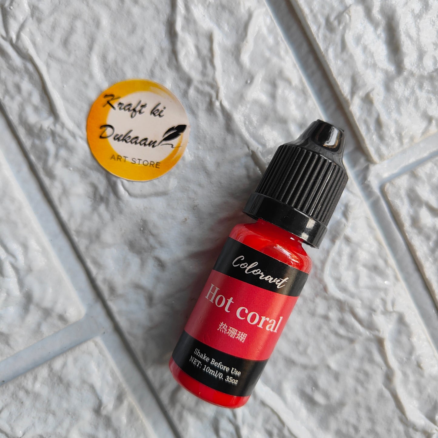 Colorant bottle of Hot Coral resin colorant from Kraft ki Dukaan for vibrant art projects