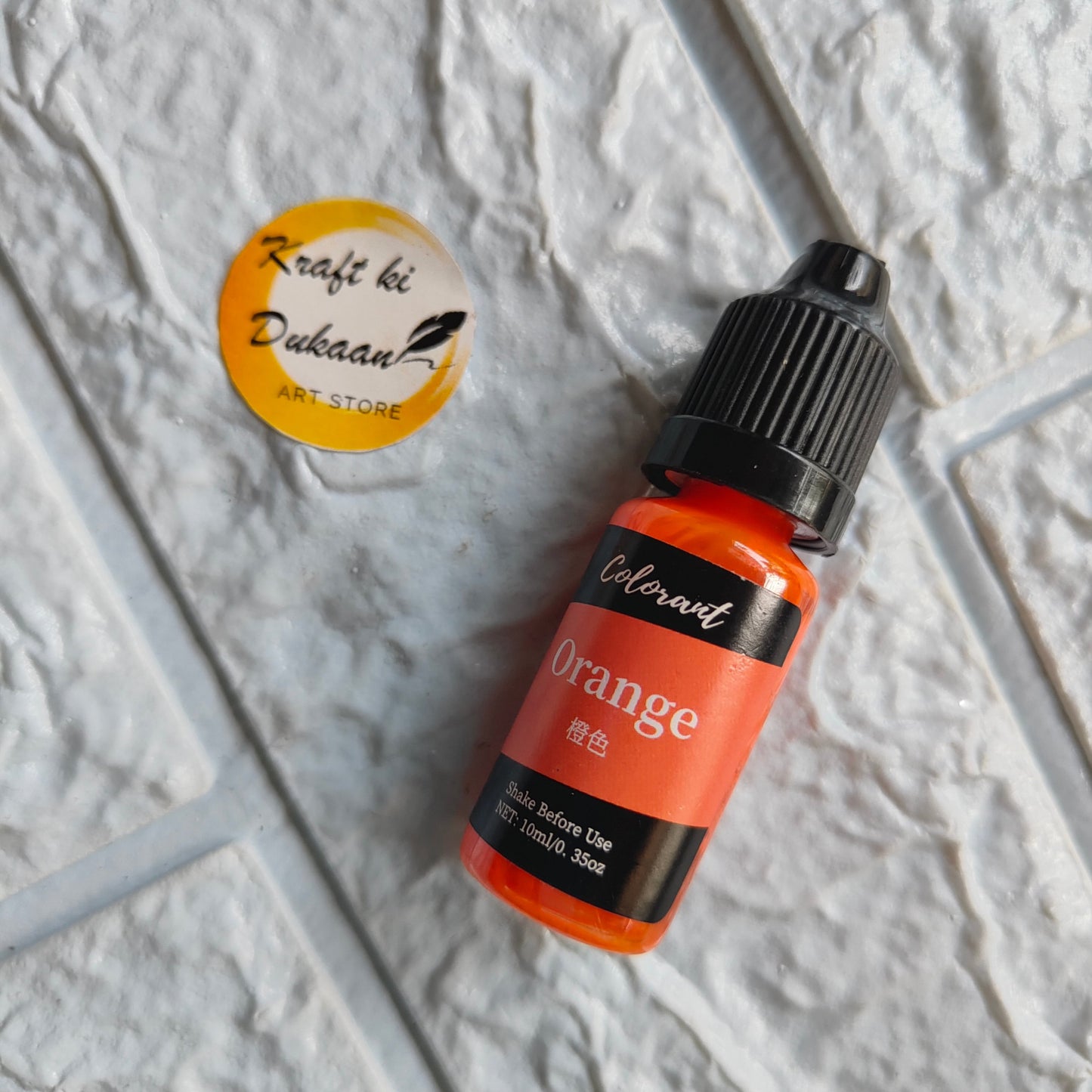 Kraft ki Dukaan Orange Resin Colorant bottle for crafting and DIY projects
