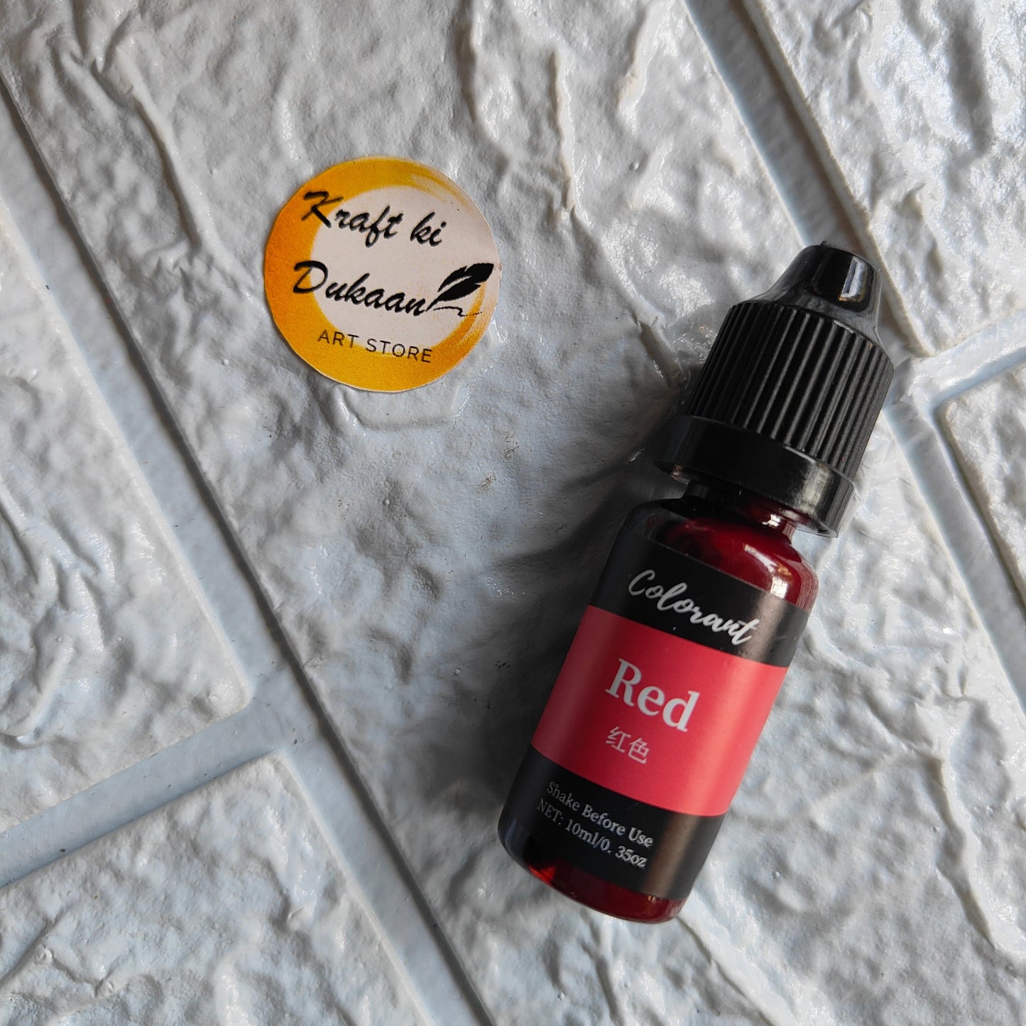 Kraft ki Dukaan red resin colorant bottle for vibrant and durable coloring in art projects