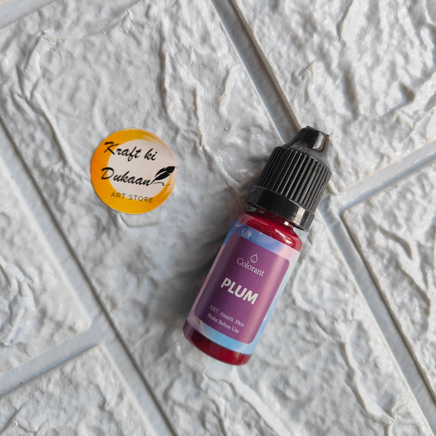 Bottle of Plum Resin Pigment Colorant by Kraft ki Dukaan for vibrant art projects