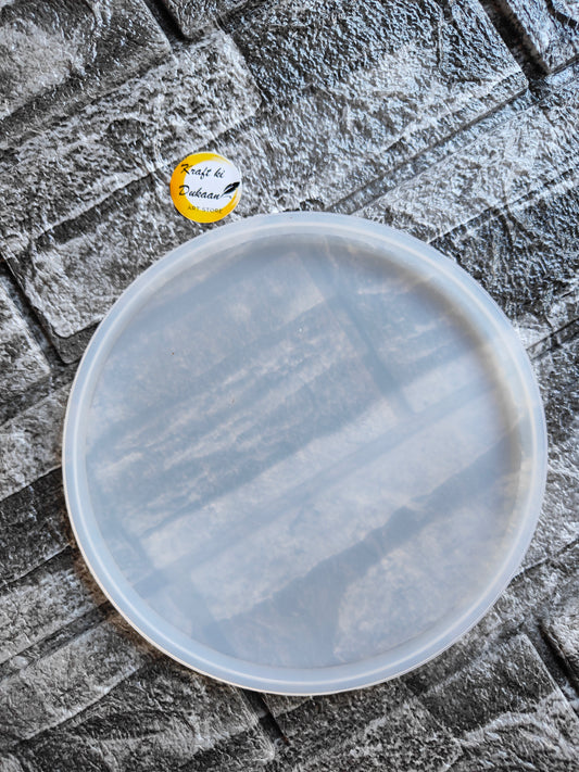 6 inch round resin mold by Kraft ki Dukaan on textured stone background for crafting projects