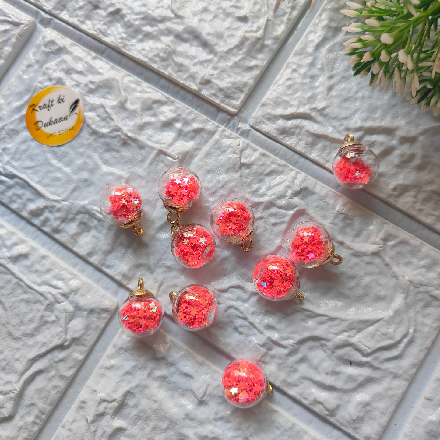 Colorful craft glass ball pendants with glittery stars for DIY jewelry projects