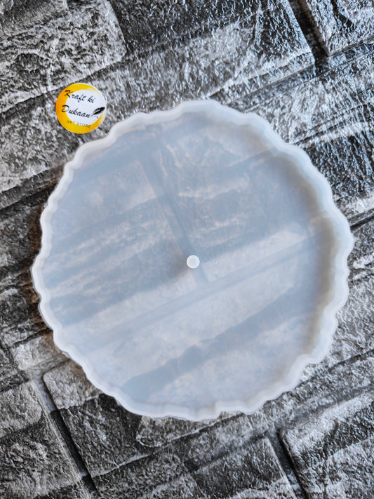 6 inch round silicone mold with scalloped edges on textured stone background by Kraft ki Dukaan