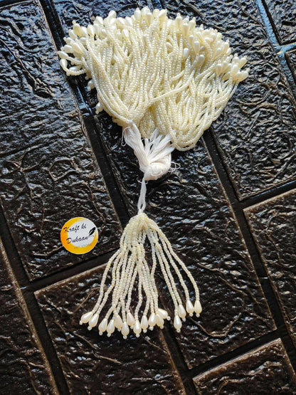 Ivory beaded Latkan tassel with full fringe and white thread tie