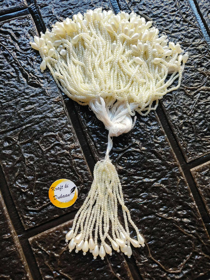 Ivory beaded Latkan tassel with long fringe and dangling pearl-like bead tips