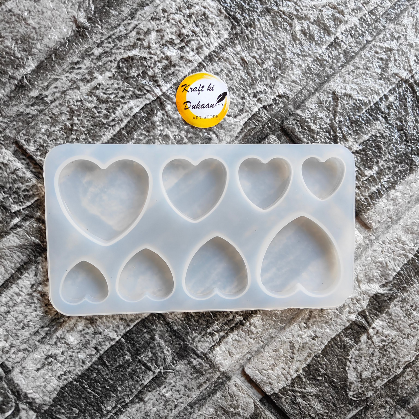 Heart-shaped resin mould from Kraft ki Dukaan with seven heart cavities for crafting projects