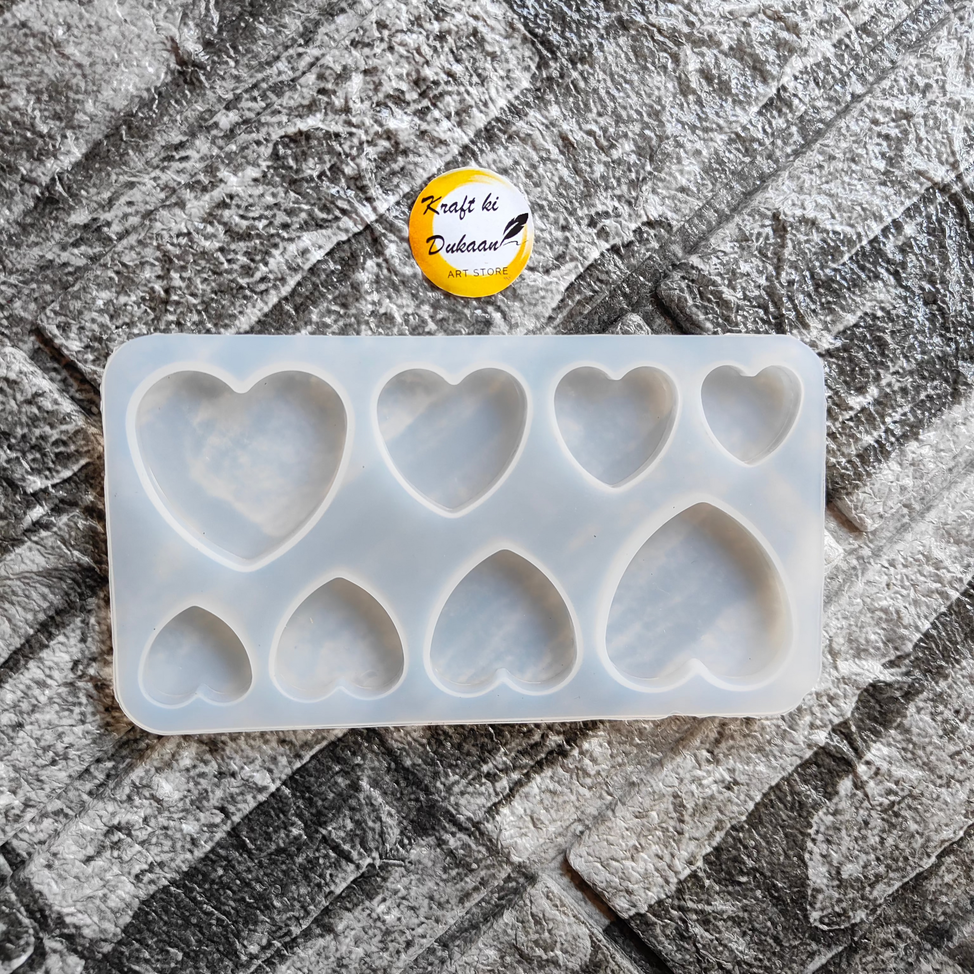 Heart-shaped resin mould from Kraft ki Dukaan with seven heart cavities for crafting projects