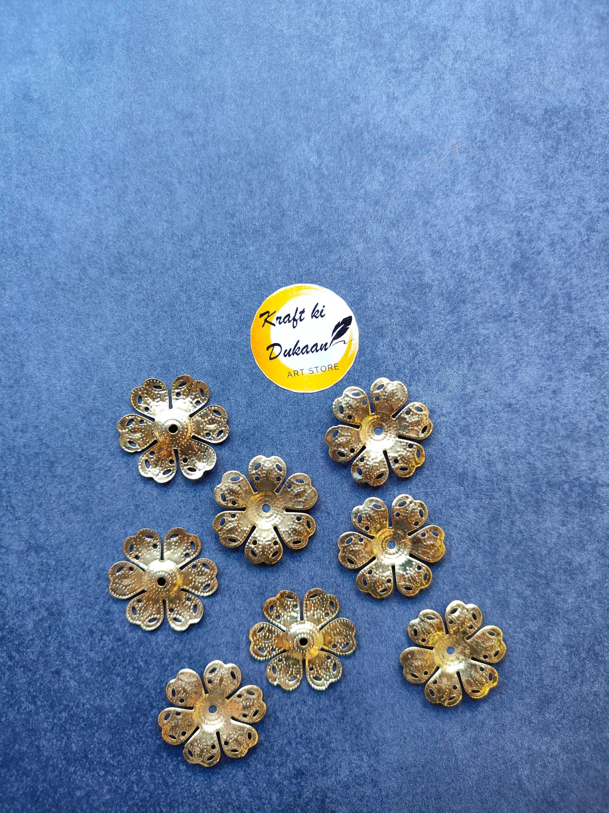 Metal flower embellishments, gold tone, round centers with petal cutouts (set of 50)