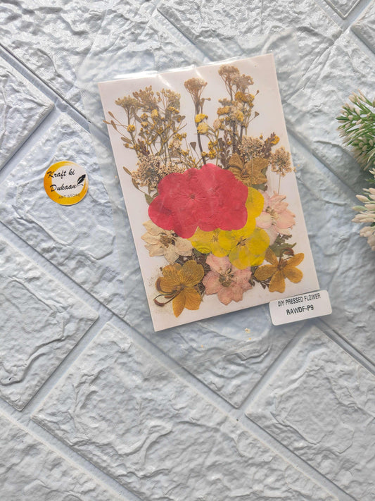 A5 pressed flower sheet mix with floral collage in pink, yellow and gold tones