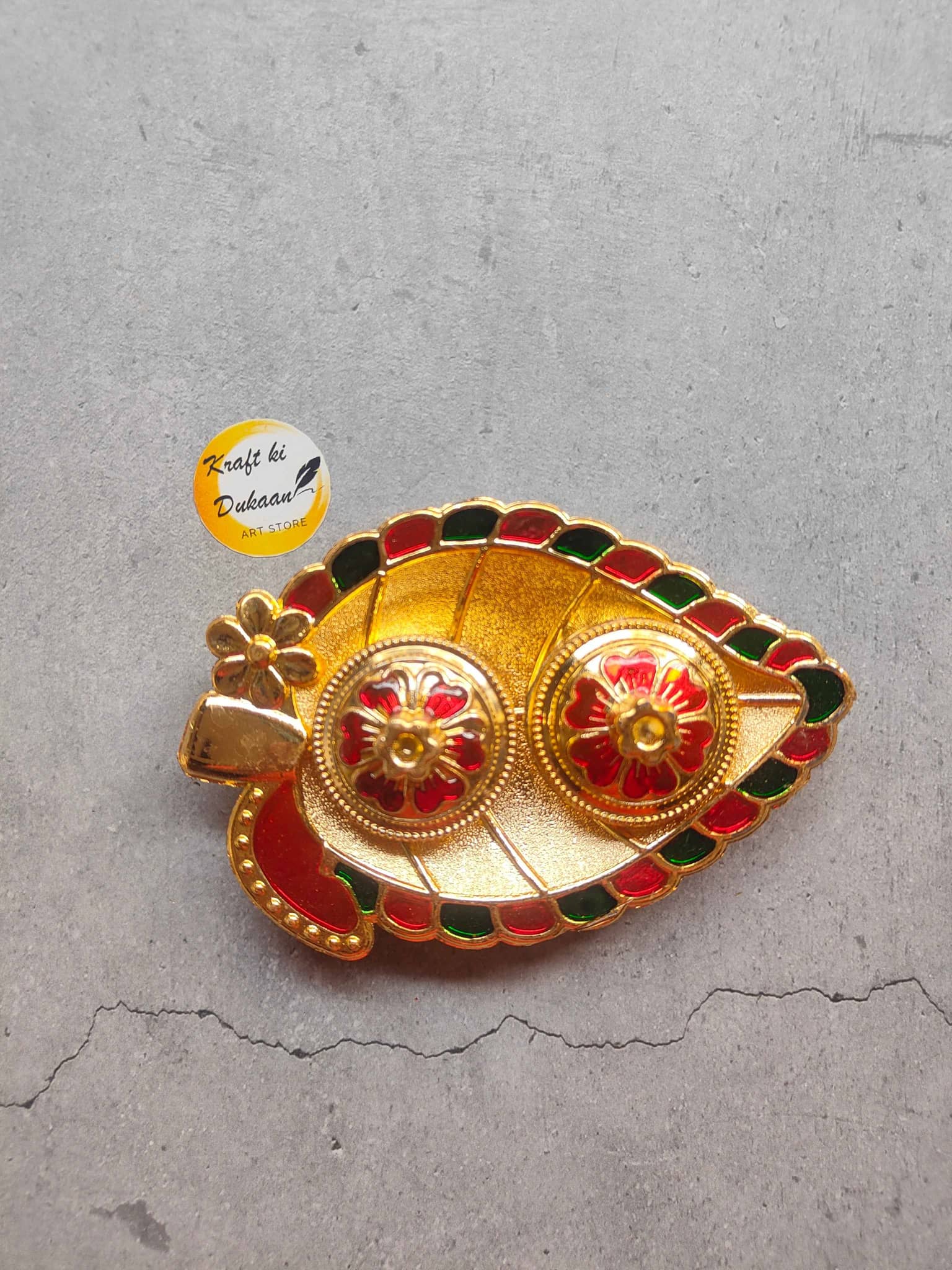 Decorative roli chawal plate for pooja with floral designs and vibrant colors