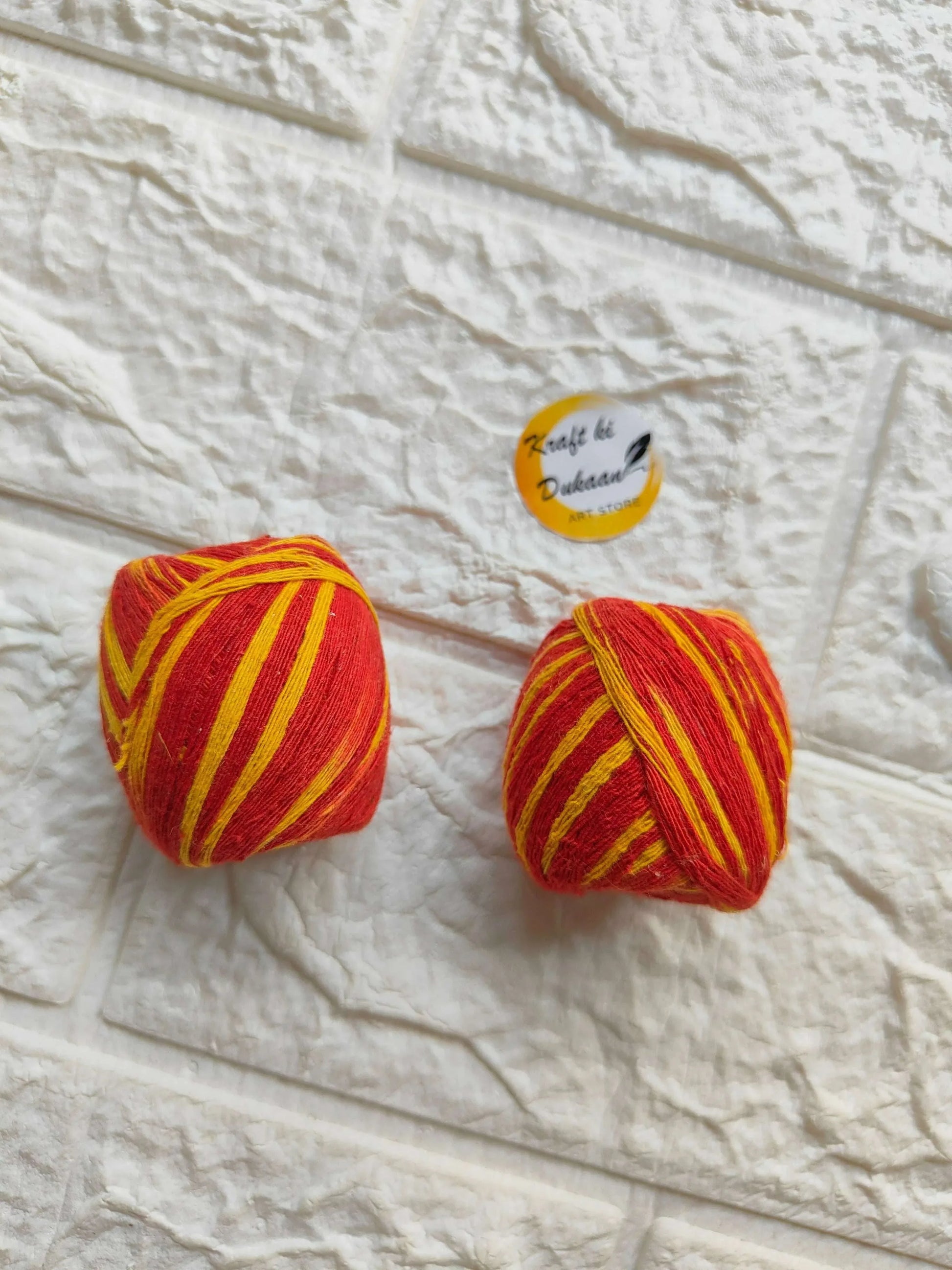 crafts-rakhi-thread-roll-red-orange-striped