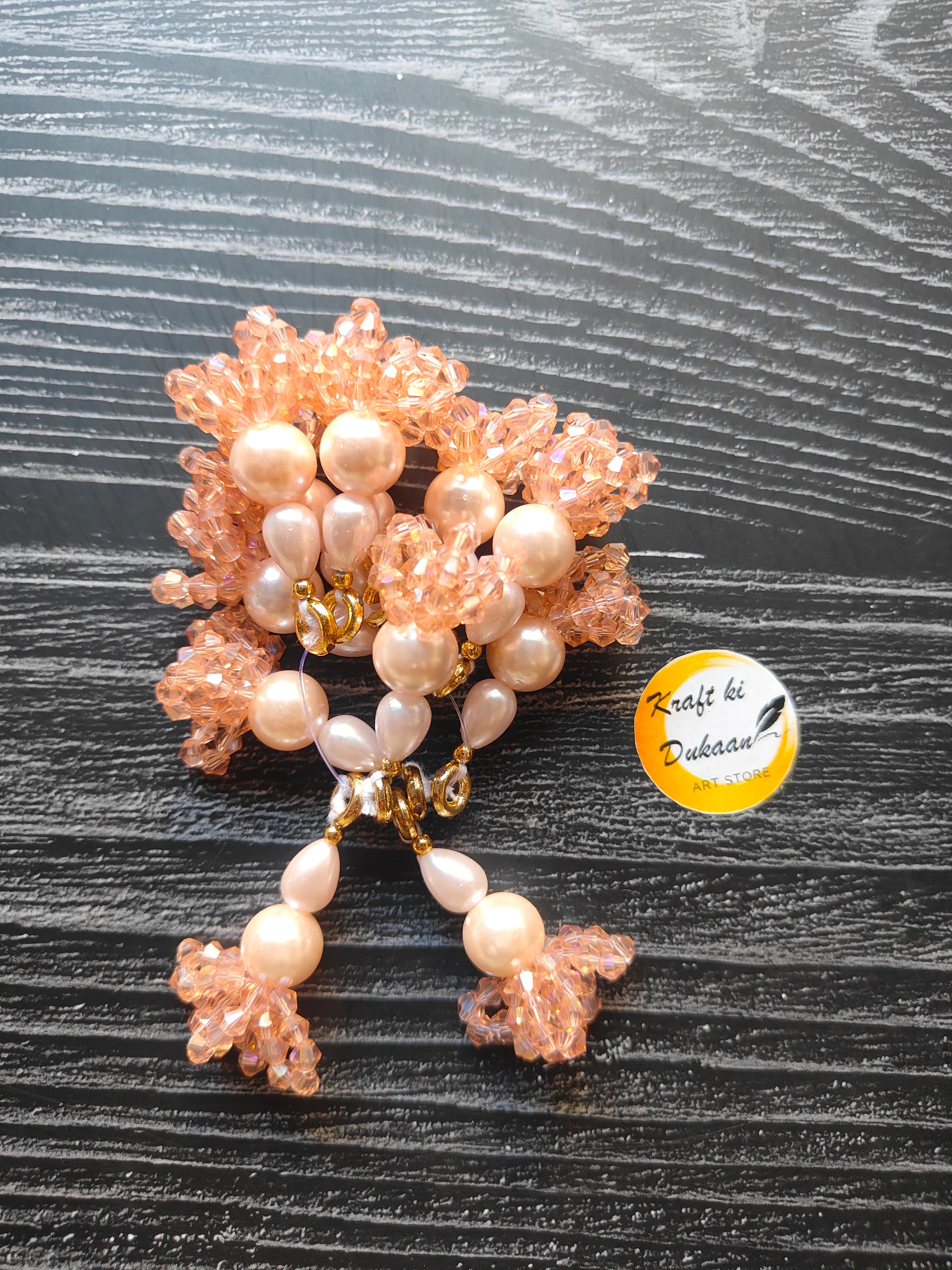Decorative latkan set online with peach beads and pearls for enhancing ethnic outfits