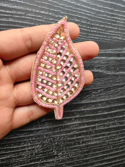 Pink sequin teardrop decorative patch with beadwork stripes and small stem