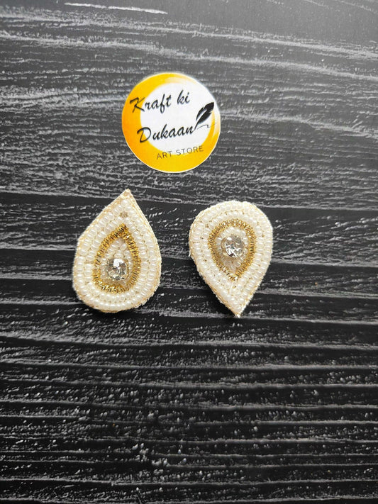 Tear-drop sequin patches: white beaded edge, gold center rhinestone