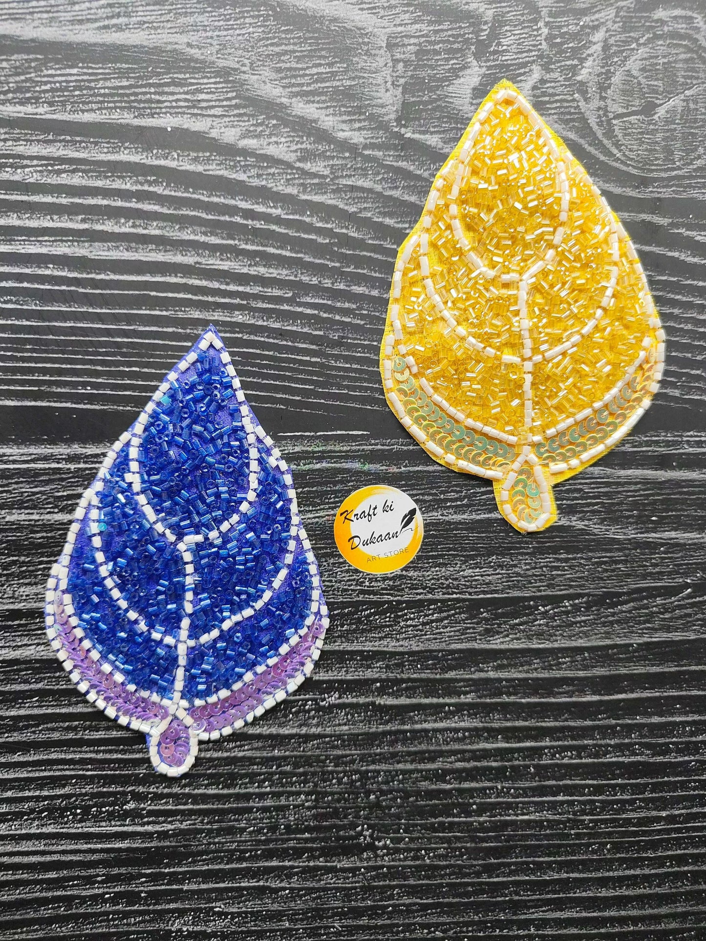 decorative-resin-leaf-patch-yellow-blue-beaded-display
