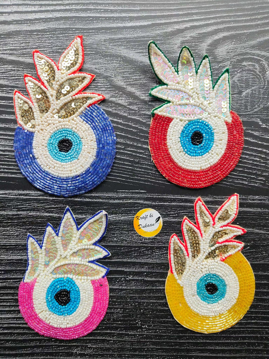 Decorative eye bead patches in multiple colors: red/blue, red/green, pink/blue, yellow/red