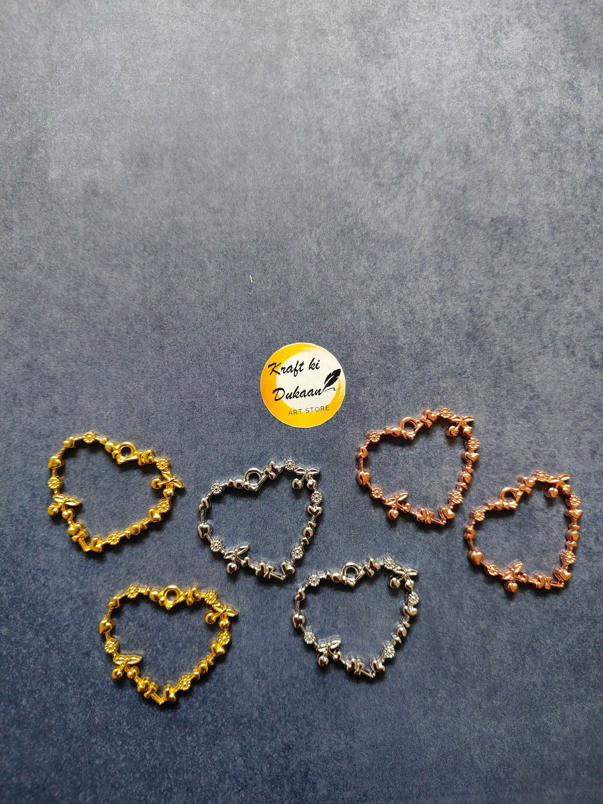 Heart bezel pendant set: heart-shaped bezels in gold, silver, and rose tones