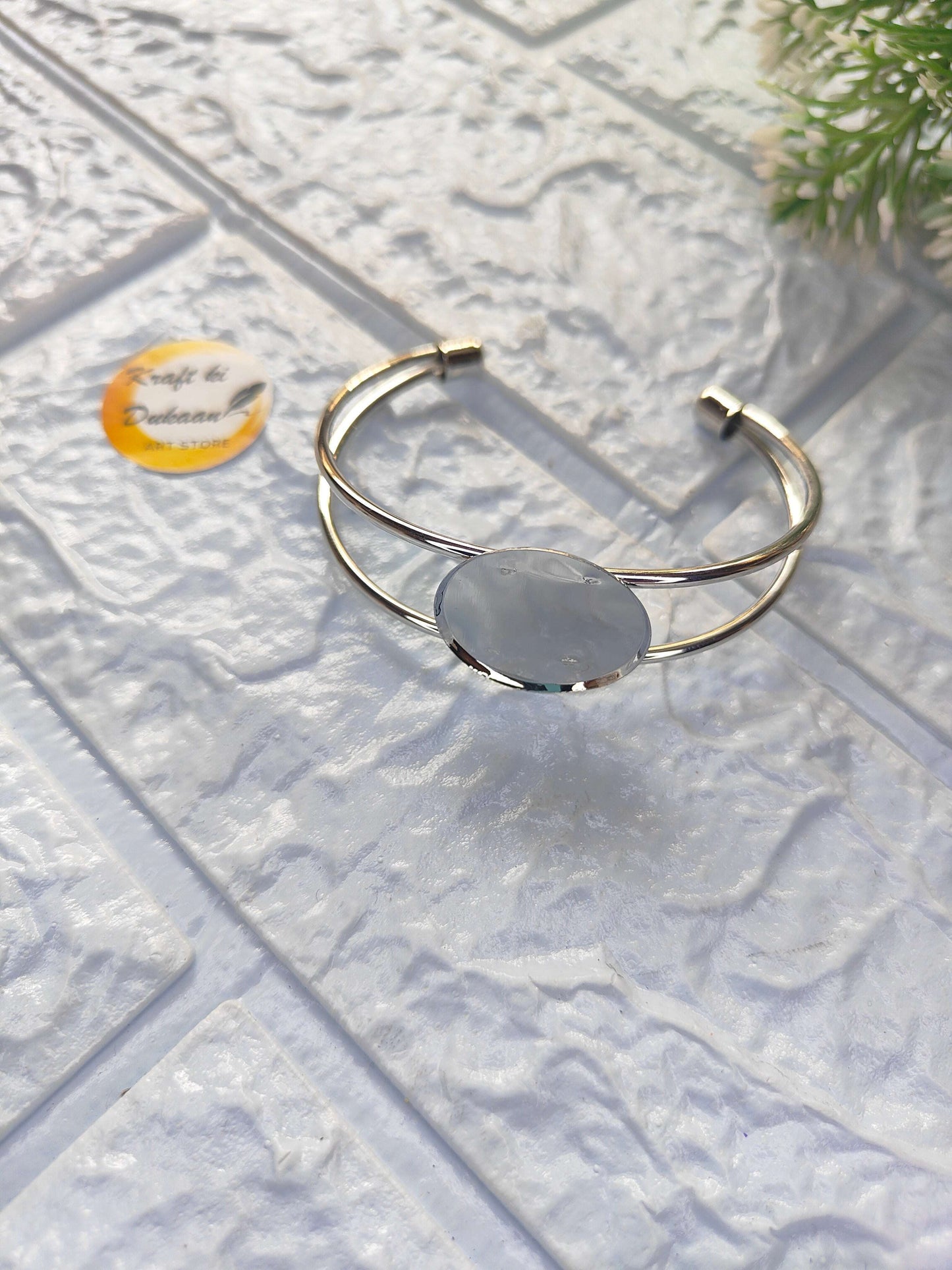 designer-resin-bracelet-blue-oval-stone-silver-band