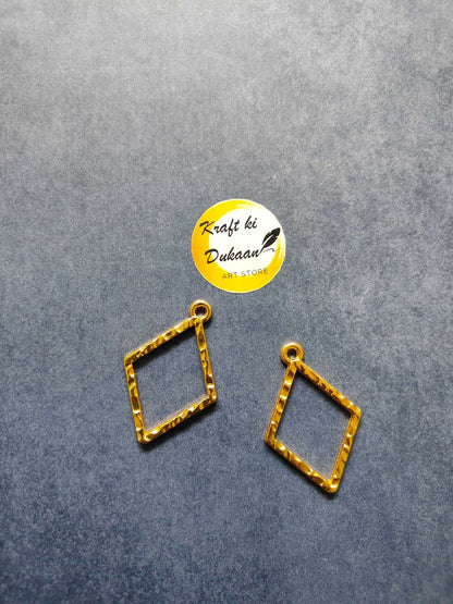Gold-tone square bezel pendant set, 3 square diamond frames with top rings