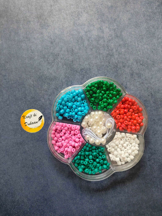Bracelet bead set with multicolor and pearl beads in compartment tray
