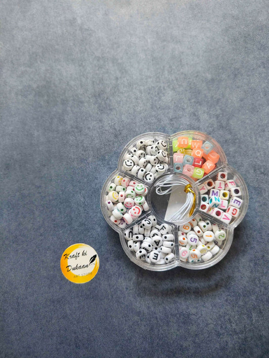 DIY bracelet bead kit in clear round case with alphabet beads and elastic cord