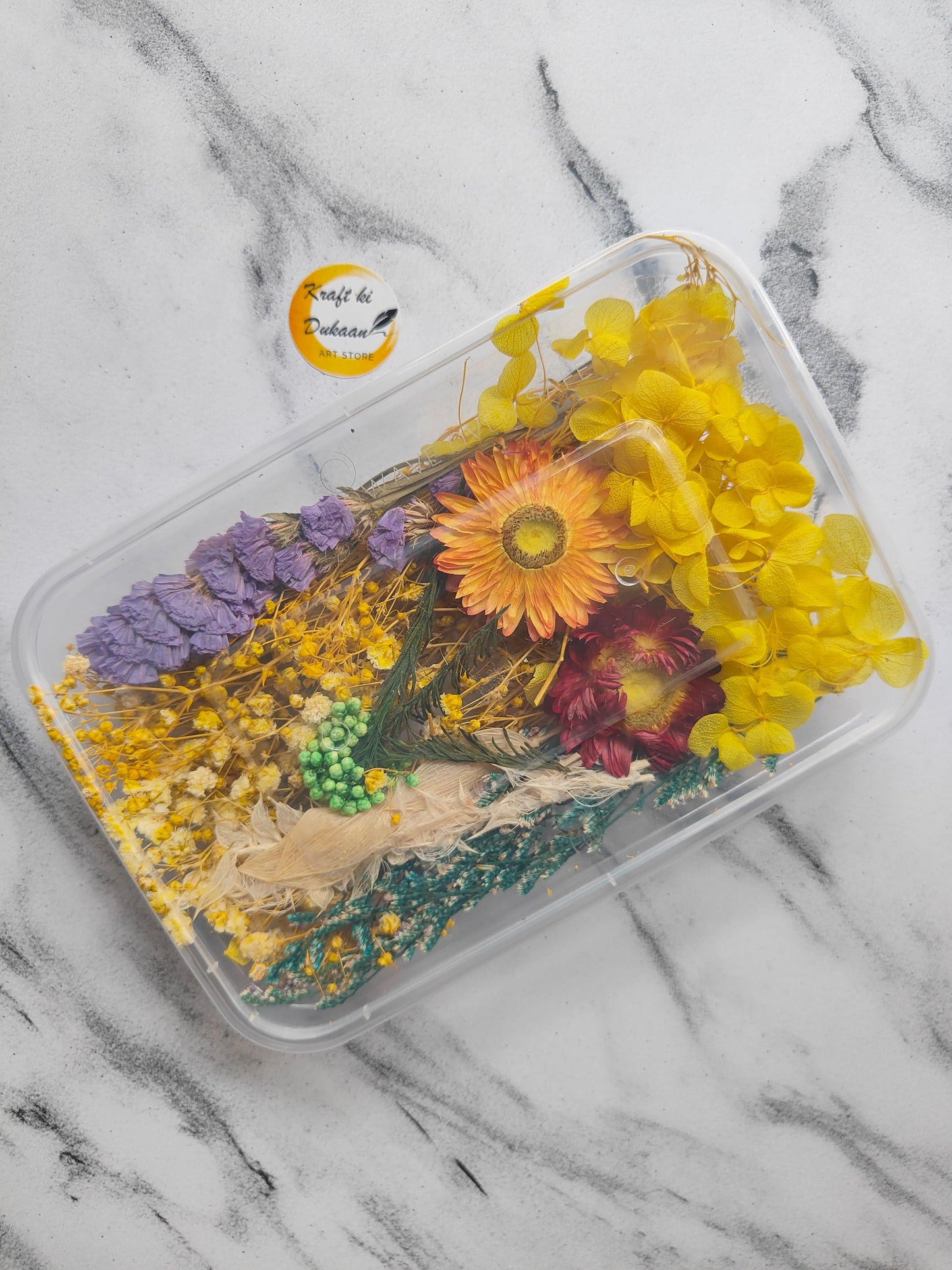 Kraft ki Dukaan dry flower box for resin art featuring vibrant yellow and purple flowers