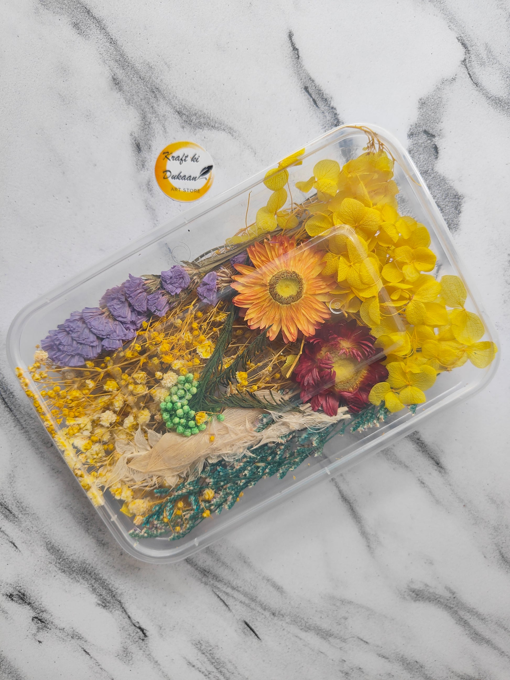 Kraft ki Dukaan dry flower box for resin art featuring vibrant yellow and purple flowers
